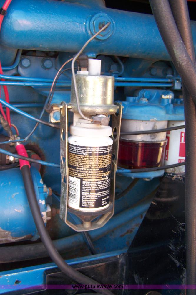 image for item 7400 1990 Ford 8630 tractor with loader