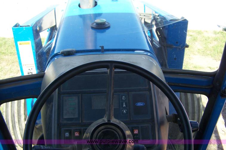image for item 7400 1990 Ford 8630 tractor with loader