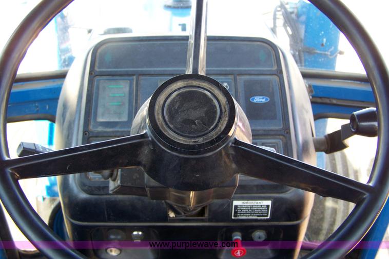 image for item 7400 1990 Ford 8630 tractor with loader