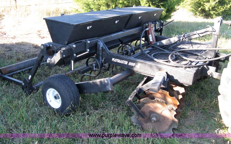 image for item 8027 Plot Master 800 feed plot drill with 93.5" fold-down roller/compactor attachemnt