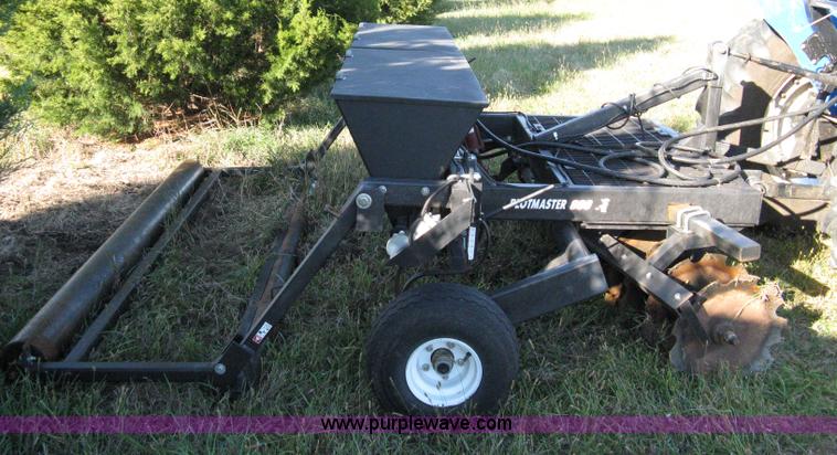 image for item 8027 Plot Master 800 feed plot drill with 93.5" fold-down roller/compactor attachemnt