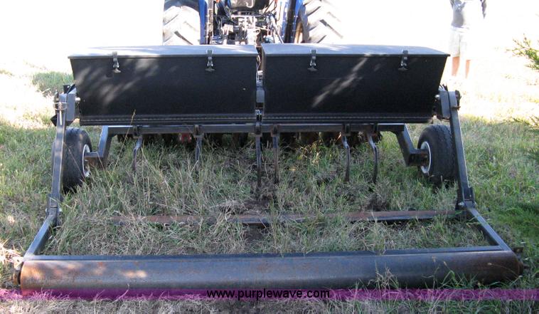 image for item 8027 Plot Master 800 feed plot drill with 93.5" fold-down roller/compactor attachemnt