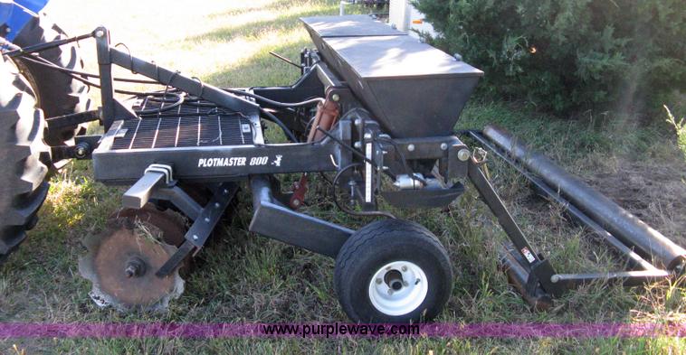 image for item 8027 Plot Master 800 feed plot drill with 93.5" fold-down roller/compactor attachemnt