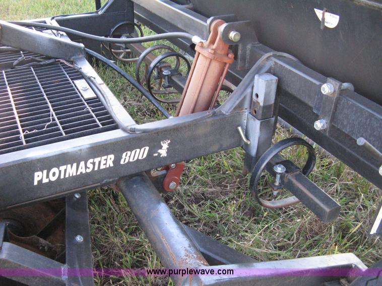 image for item 8027 Plot Master 800 feed plot drill with 93.5" fold-down roller/compactor attachemnt