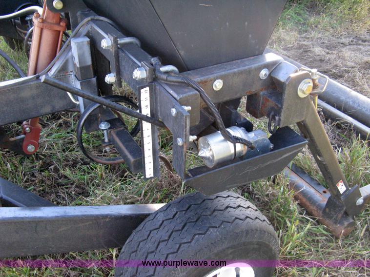 image for item 8027 Plot Master 800 feed plot drill with 93.5" fold-down roller/compactor attachemnt