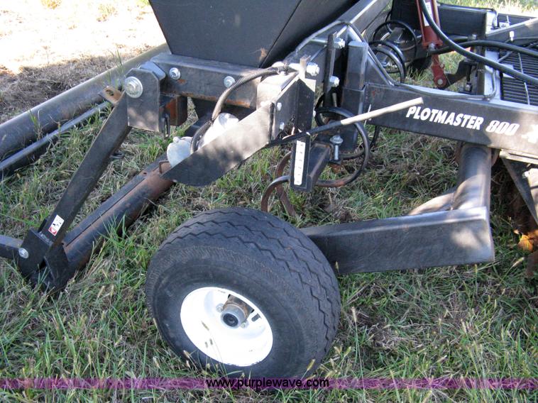 image for item 8027 Plot Master 800 feed plot drill with 93.5" fold-down roller/compactor attachemnt