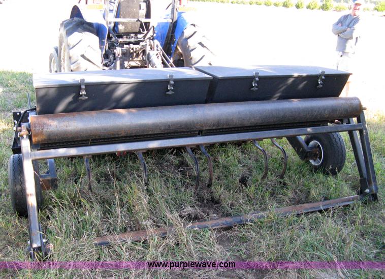 image for item 8027 Plot Master 800 feed plot drill with 93.5" fold-down roller/compactor attachemnt