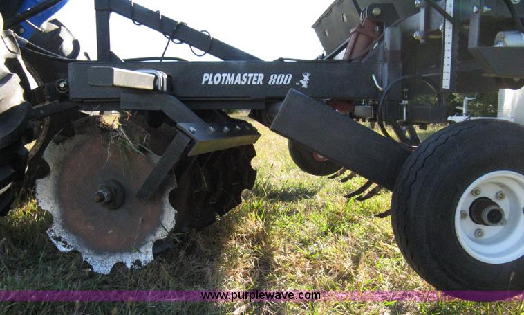 image for item 8027 Plot Master 800 feed plot drill with 93.5" fold-down roller/compactor attachemnt
