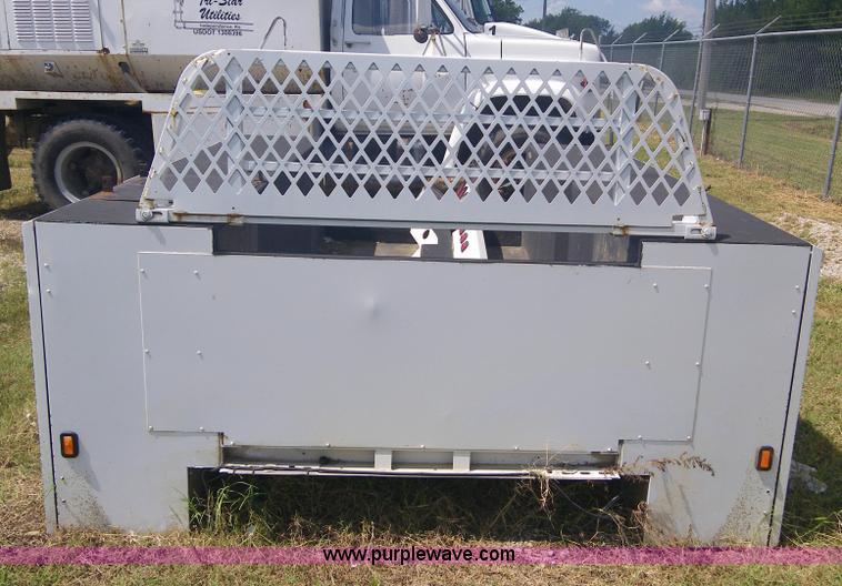 image for item 1955 Stahl mechanic bed with bumper and headache rack