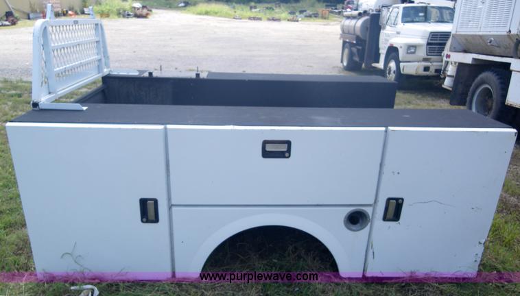 image for item 1955 Stahl mechanic bed with bumper and headache rack