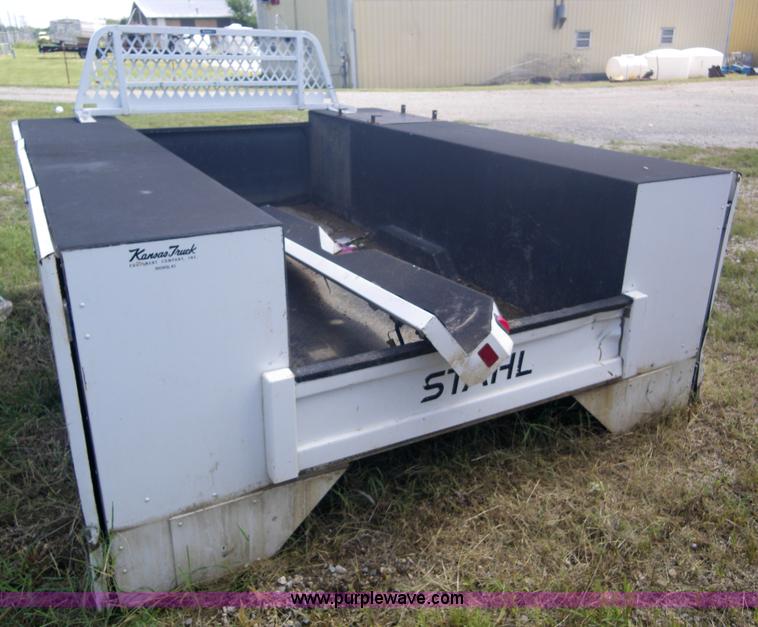 image for item 1955 Stahl mechanic bed with bumper and headache rack