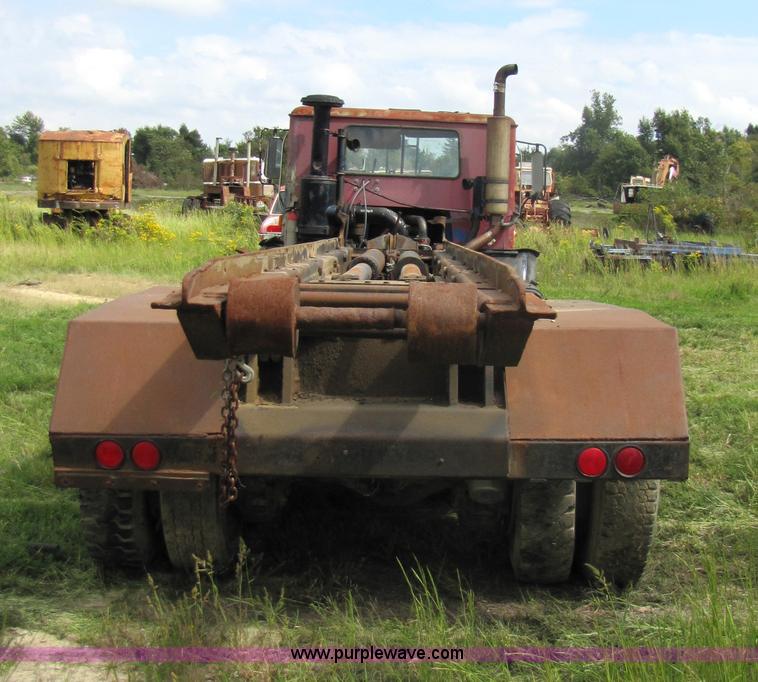 image for item 3444 1984 Mack MR685S rolloff truck