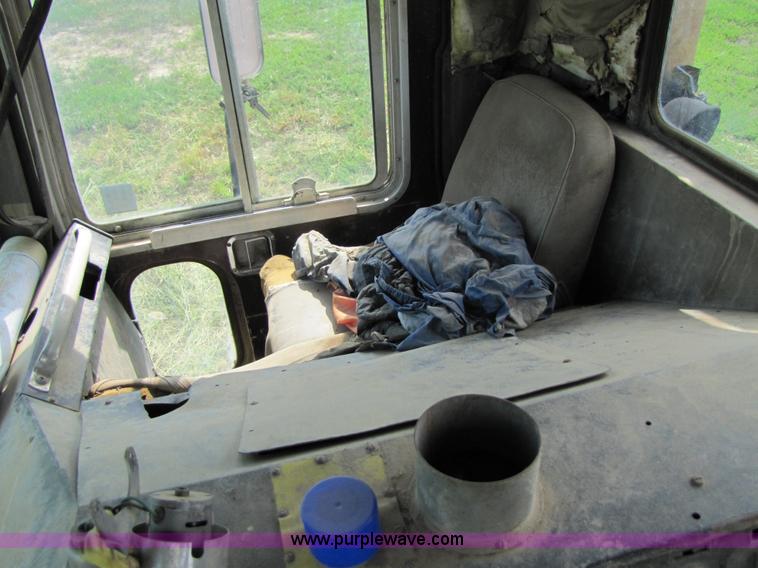 image for item 3444 1984 Mack MR685S rolloff truck