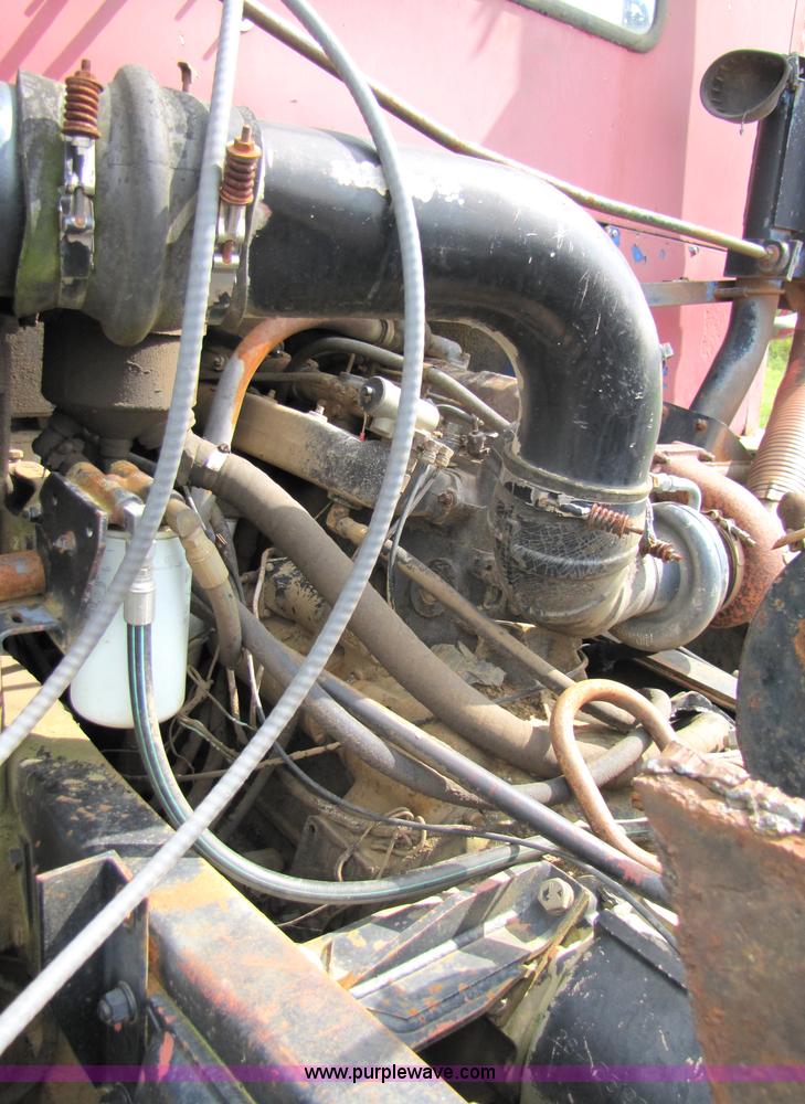 image for item 3444 1984 Mack MR685S rolloff truck