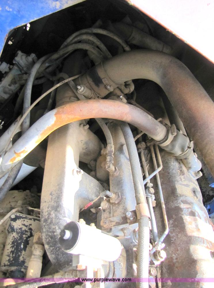 image for item 3444 1984 Mack MR685S rolloff truck