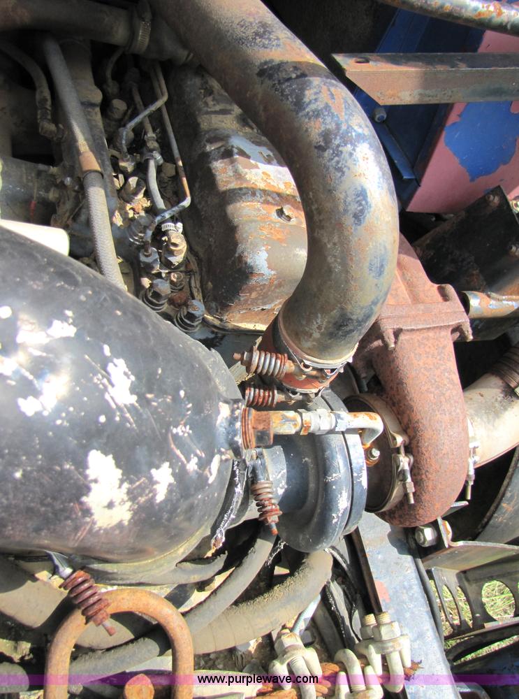 image for item 3444 1984 Mack MR685S rolloff truck