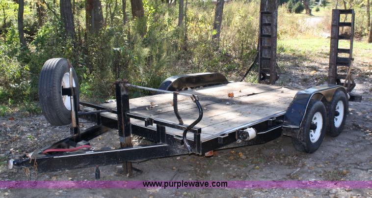 image for item 4707 1996 double axle trailer with ramps