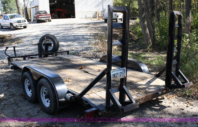 image for item 4707 1996 double axle trailer with ramps
