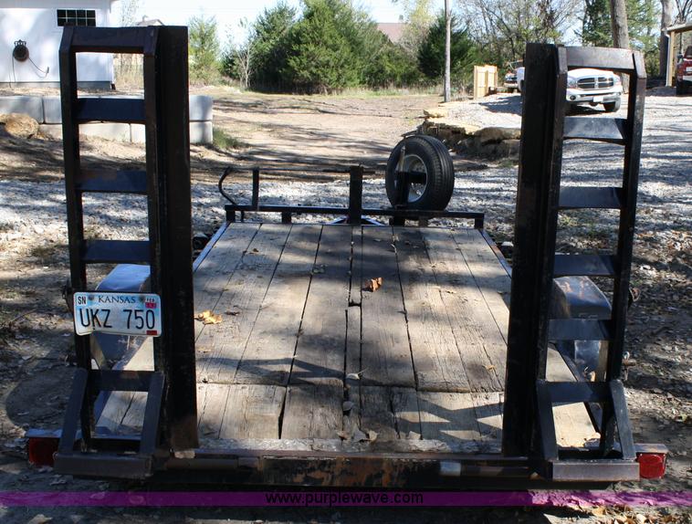 image for item 4707 1996 double axle trailer with ramps