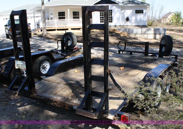 image for item 4707 1996 double axle trailer with ramps