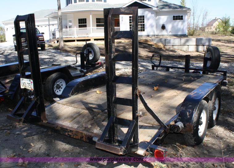image for item 4707 1996 double axle trailer with ramps