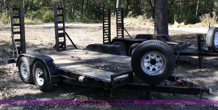 image for item 4707 1996 double axle trailer with ramps
