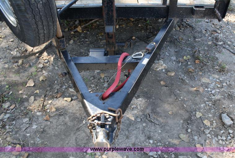 image for item 4707 1996 double axle trailer with ramps