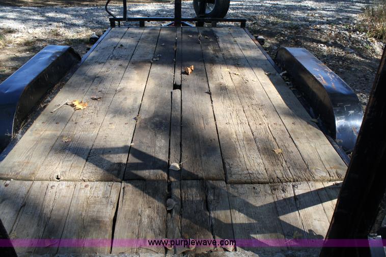 image for item 4707 1996 double axle trailer with ramps