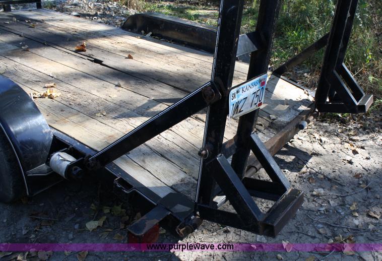 image for item 4707 1996 double axle trailer with ramps