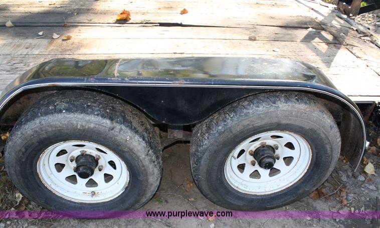 image for item 4707 1996 double axle trailer with ramps