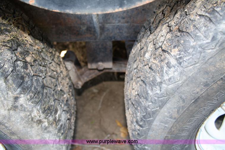 image for item 4707 1996 double axle trailer with ramps