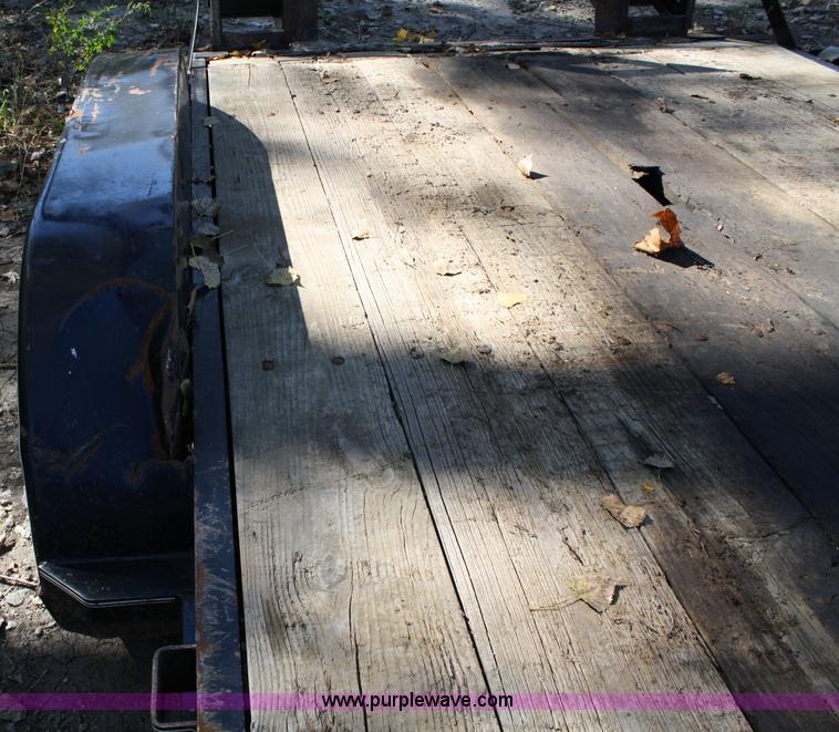image for item 4707 1996 double axle trailer with ramps