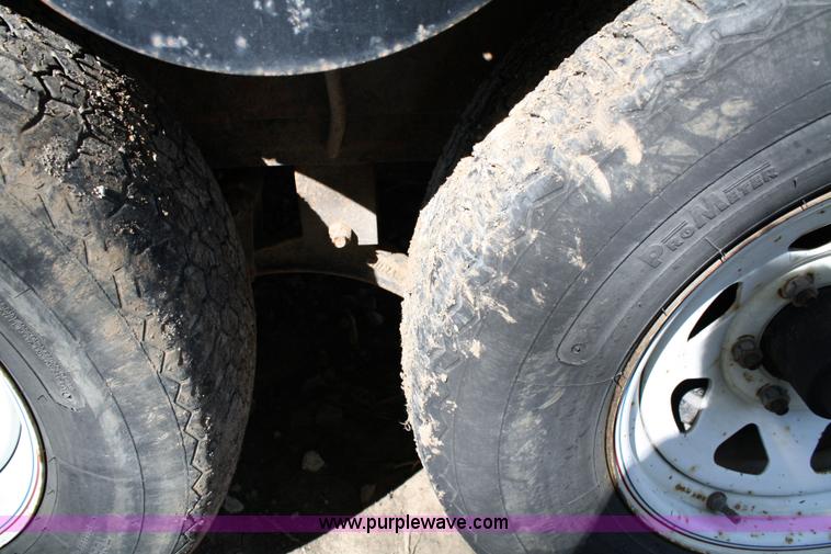 image for item 4707 1996 double axle trailer with ramps