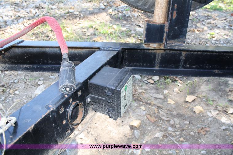 image for item 4707 1996 double axle trailer with ramps