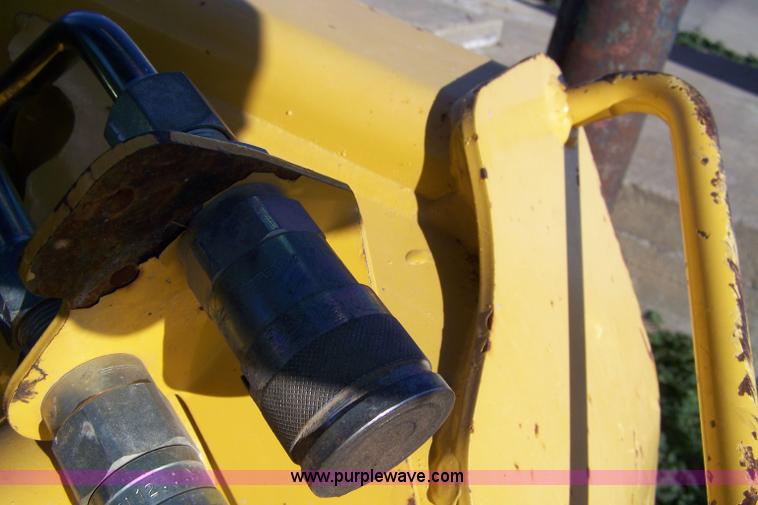 image for item 7377 2004 John Deere 240II skid steer