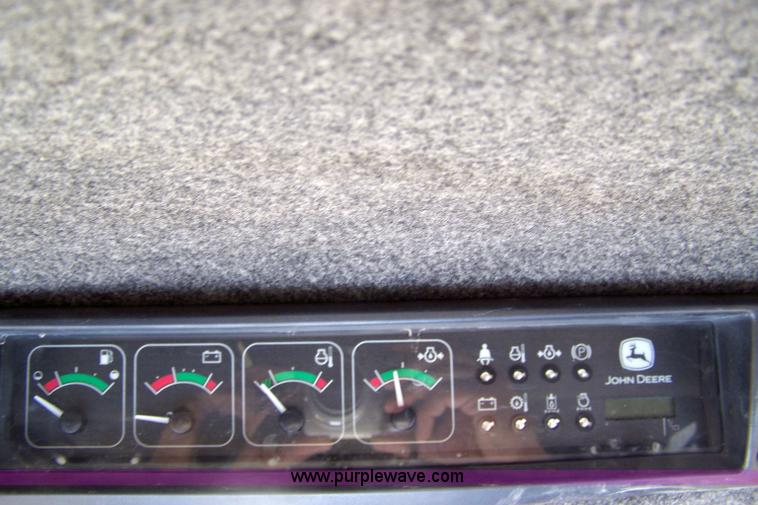 image for item 7377 2004 John Deere 240II skid steer