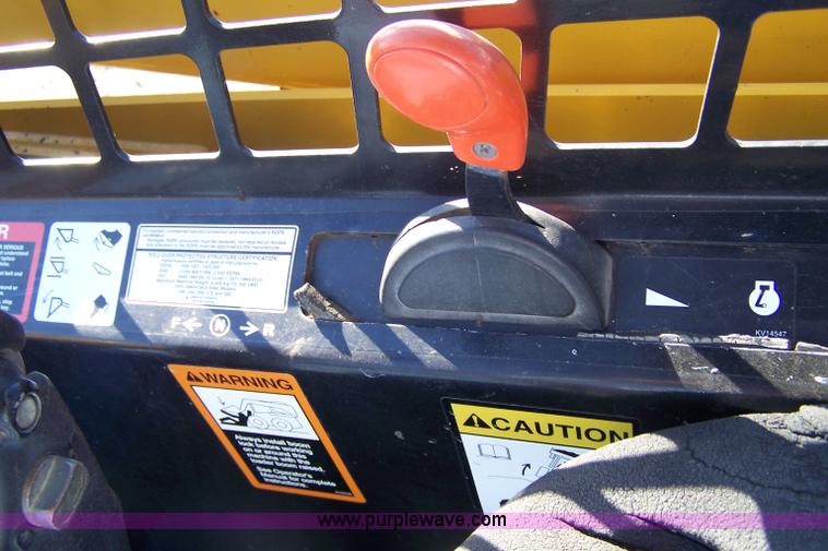 image for item 7377 2004 John Deere 240II skid steer