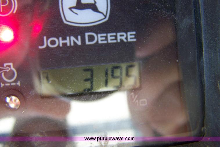 image for item 7377 2004 John Deere 240II skid steer