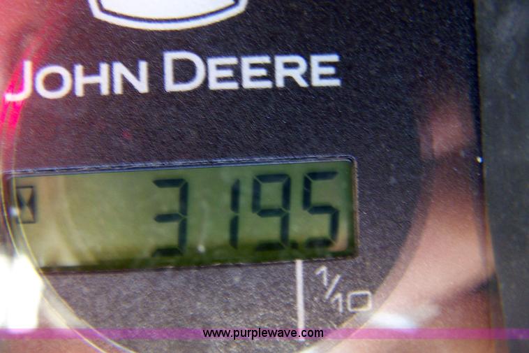 image for item 7377 2004 John Deere 240II skid steer