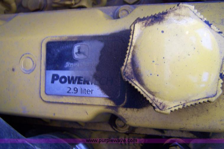 image for item 7377 2004 John Deere 240II skid steer