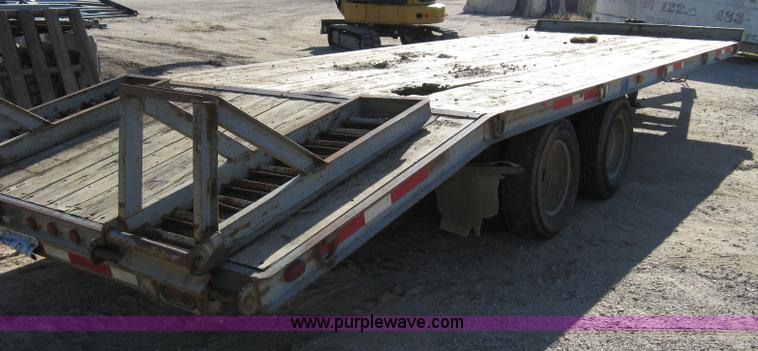 image for item 8041 1997 Circle D 25BHFB dual tandem axle flatbed trailer