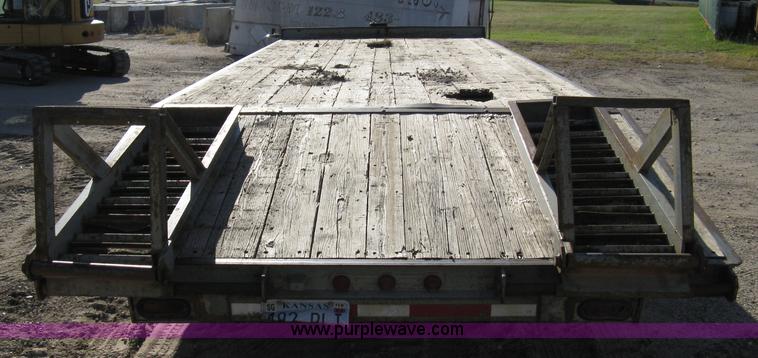 image for item 8041 1997 Circle D 25BHFB dual tandem axle flatbed trailer