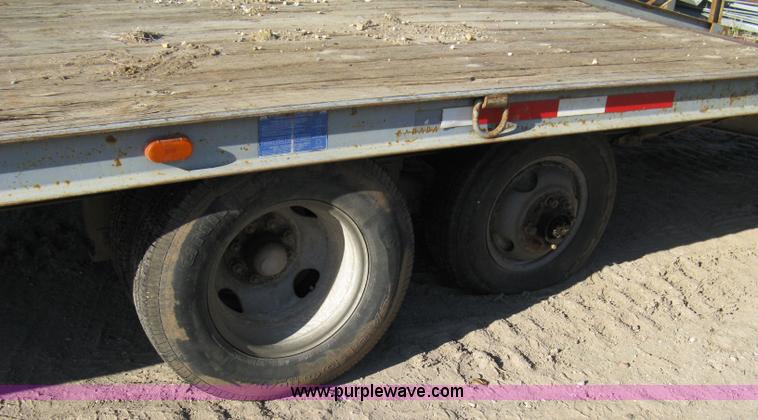 image for item 8041 1997 Circle D 25BHFB dual tandem axle flatbed trailer