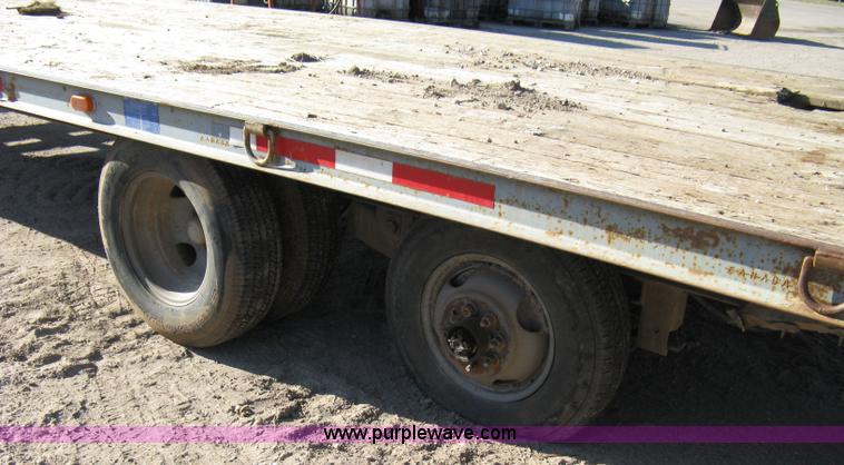 image for item 8041 1997 Circle D 25BHFB dual tandem axle flatbed trailer