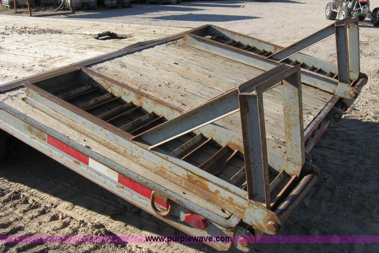 image for item 8041 1997 Circle D 25BHFB dual tandem axle flatbed trailer