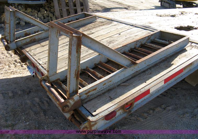 image for item 8041 1997 Circle D 25BHFB dual tandem axle flatbed trailer