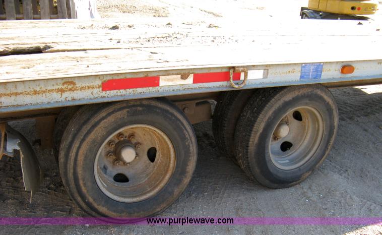 image for item 8041 1997 Circle D 25BHFB dual tandem axle flatbed trailer