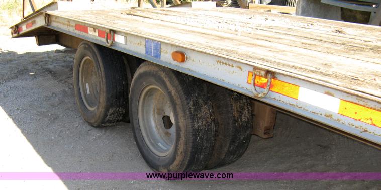 image for item 8041 1997 Circle D 25BHFB dual tandem axle flatbed trailer