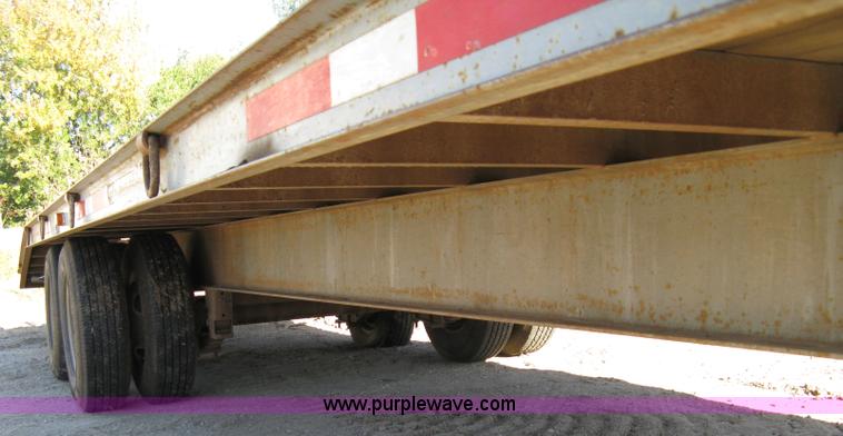 image for item 8041 1997 Circle D 25BHFB dual tandem axle flatbed trailer