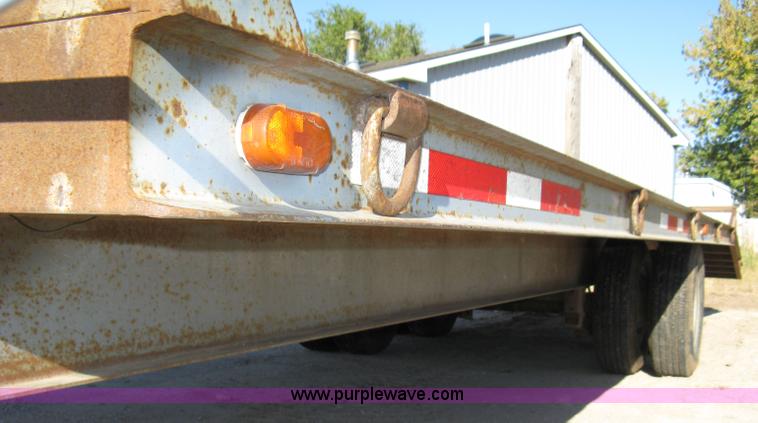 image for item 8041 1997 Circle D 25BHFB dual tandem axle flatbed trailer